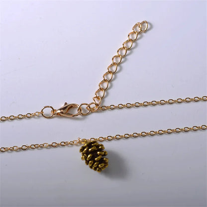 PENDENTIF POMME DE PIN