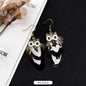 BOUCLES D'OREILLES PLUME
